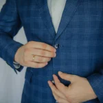 man in blue and white plaid button up long sleeve shirt